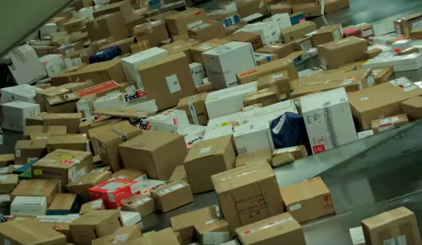 FedEx parcels stacked sorting
