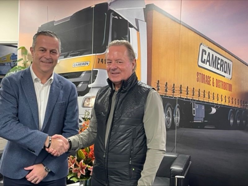 Camerons DHL Supply Chain handshake