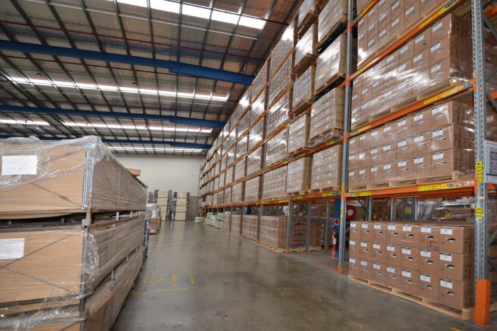 Tony Innamio warehouse stacked pallets,