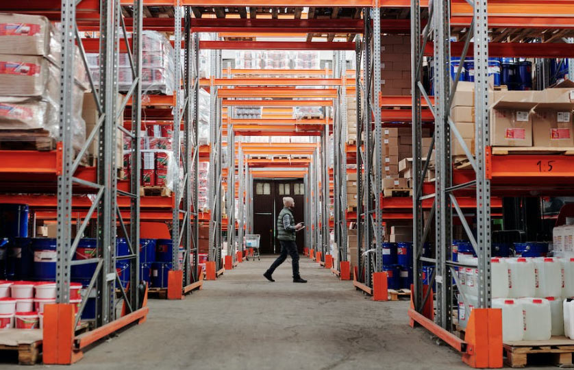 one world courier warehouse logistics tall racks stock 