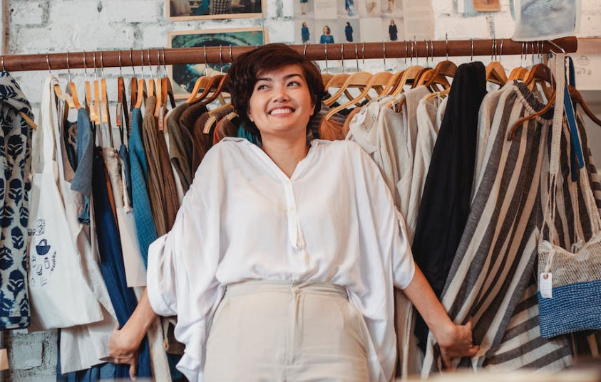 woman clothes rack shopping retail